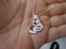Picture of Silver Mother and 3 Children Necklace